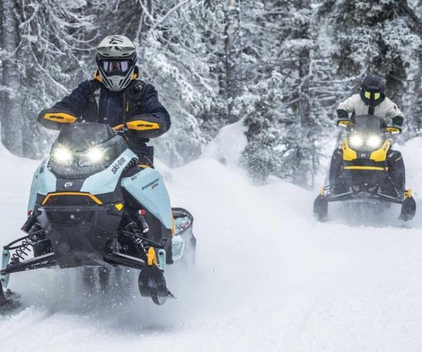 Explore the depths of the Canadian forest in Snowmobile – Quebec, Canada