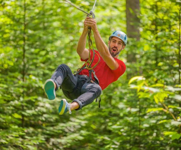 From Montreal: Treetop Trekking, Ziplines and beach activity – Montreal, Canada