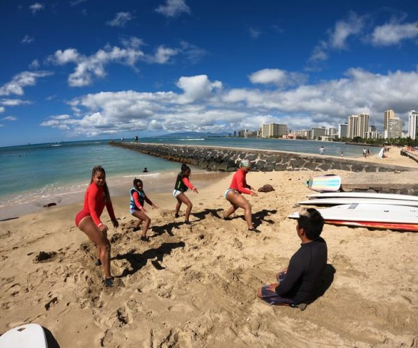 Family Surfing Lesson: 1 parent, 1 child under 13, & others – Honolulu, Hawaii