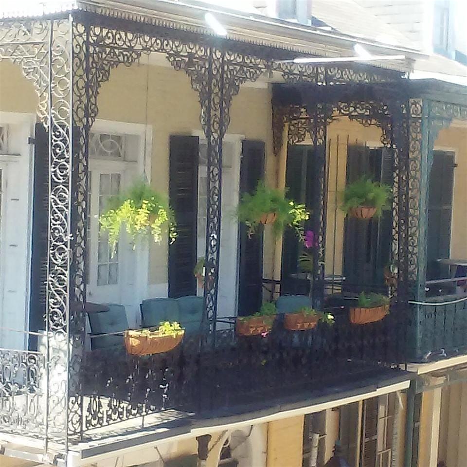 Mardi Gras Balcony on Bourbon Street in Magical Speakeasy – New Orleans, LA